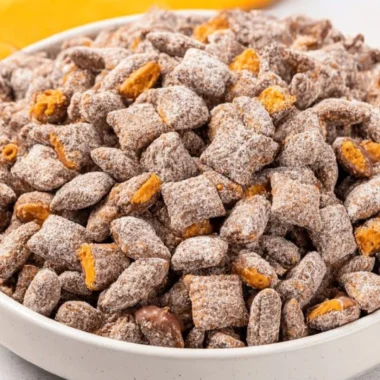 Delicious Butterfinger Puppy Chow snack mix with chocolate and peanut butter