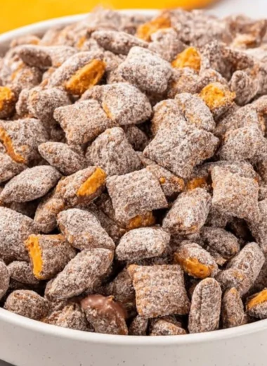 Delicious Butterfinger Puppy Chow snack mix with chocolate and peanut butter