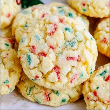 Delicious Christmas Gooey Butter Cookies stacked on a plate