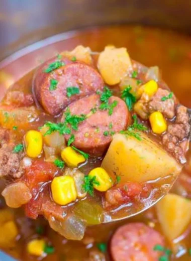 Delicious bowl of Cowboy Stew filled with beef, beans, and vegetables