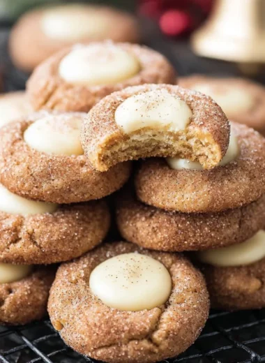 Cozy eggnog snickerdoodle thumbprint cookies decorated for the holidays.