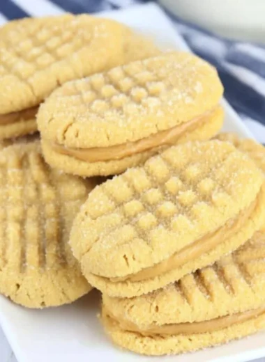 Plate of homemade Nutter Butters cookies with creamy filling