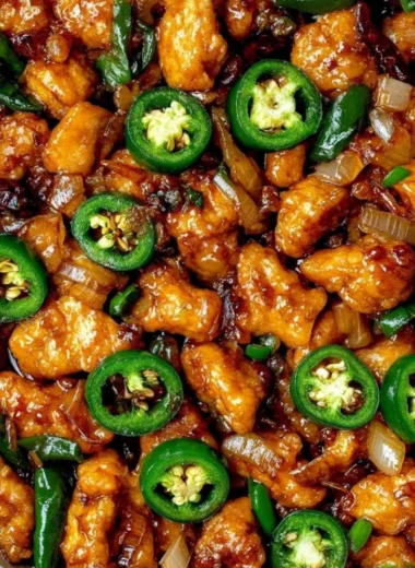 Deliciously baked jalapeño chicken served on a cozy dinner table.