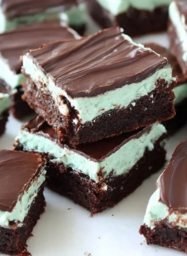 Deliciously rich mint brownies topped with a glossy chocolate layer