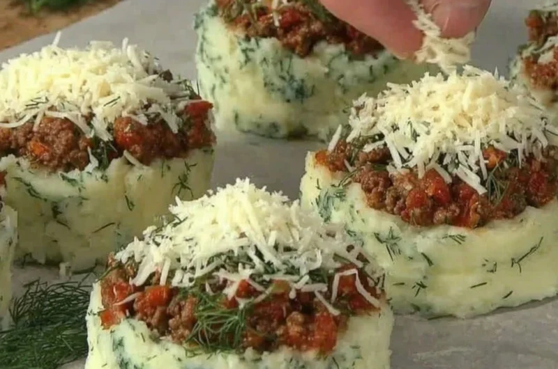 Stuffed mashed potato nests filled with savory ingredients