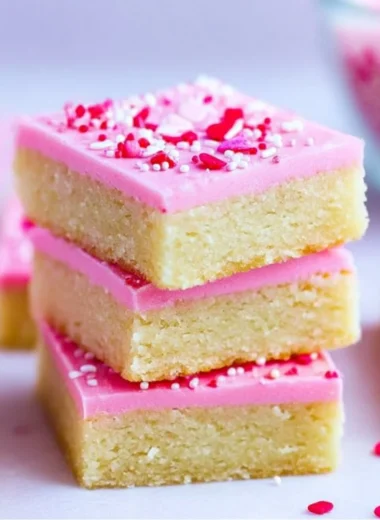 Delicious homemade sugar cookie bars displayed on a wooden table