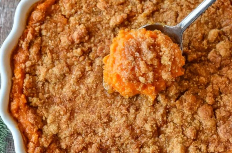 Creamy sweet potato casserole topped with marshmallows, a perfect fall dish