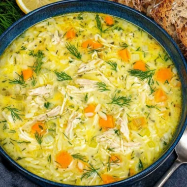 A bowl of healthy Turkey Lentil Soup with fresh ingredients and spices.