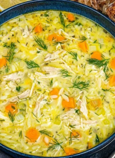 A bowl of healthy Turkey Lentil Soup with fresh ingredients and spices.