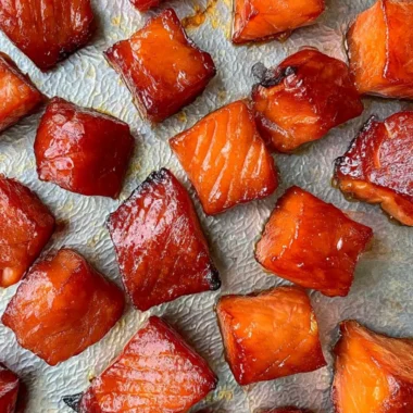 Appetizing candied smoked salmon bites on a serving platter