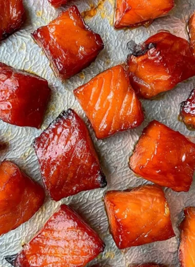 Appetizing candied smoked salmon bites on a serving platter