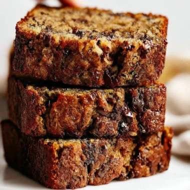 Slice of homemade chocolate chip banana bread with chocolate morsels
