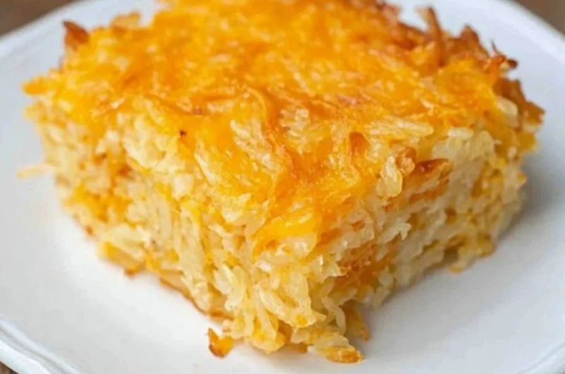 Delicious Cracker Barrel Hash Brown Casserole with cheese and crispy topping