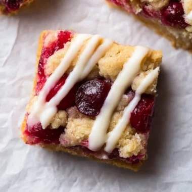 Delicious cranberry crumble bars with a buttery topping and fresh cranberries