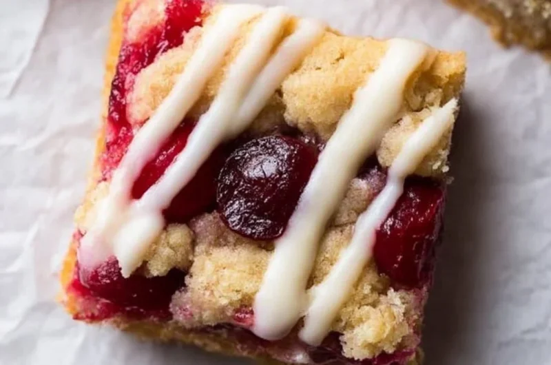 Delicious cranberry crumble bars with a buttery topping and fresh cranberries
