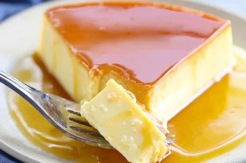 Delicious homemade caramel flan dessert topped with golden caramel sauce.