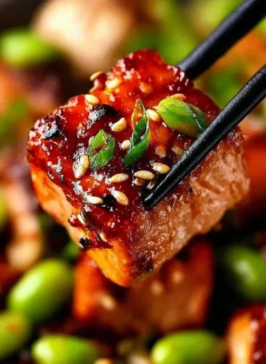 Delicious Honey Sriracha Salmon Bowl with vibrant vegetables and rice.