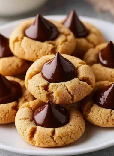 Irresistible High Altitude Peanut Butter Blossom Cookies on a plate