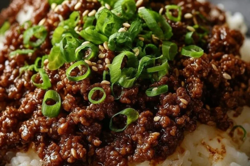 Korean Ground Beef Bowl garnished with vegetables and sesame seeds