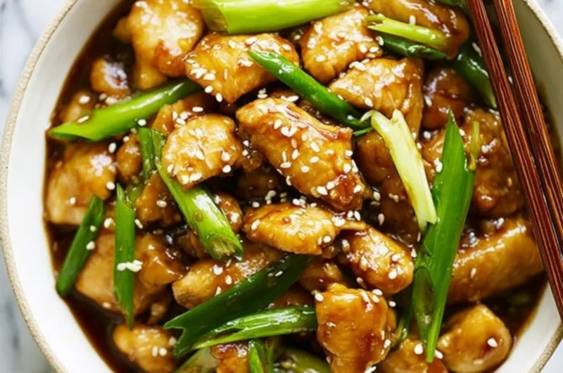 Plate of Mongolian Chicken with vegetables and rice