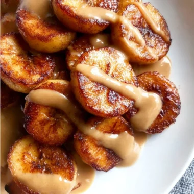Portion Fix Fried Cinnamon Bananas served on a plate, garnished with cinnamon.