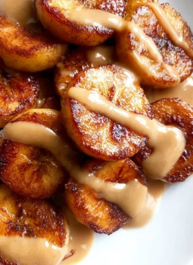 Portion Fix Fried Cinnamon Bananas served on a plate, garnished with cinnamon.