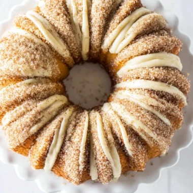 Delicious Snickerdoodle Bundt Cake topped with cinnamon and sugar
