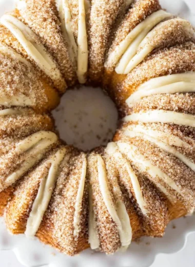 Delicious Snickerdoodle Bundt Cake topped with cinnamon and sugar