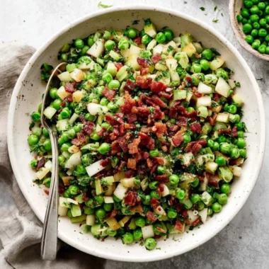 Thanksgiving pea salad with pancetta and pears served in a bowl