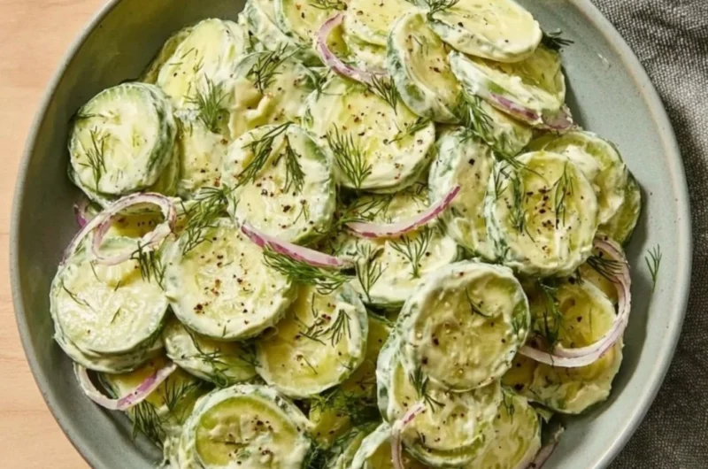 High-protein cucumber salad with colorful vegetables and dressing