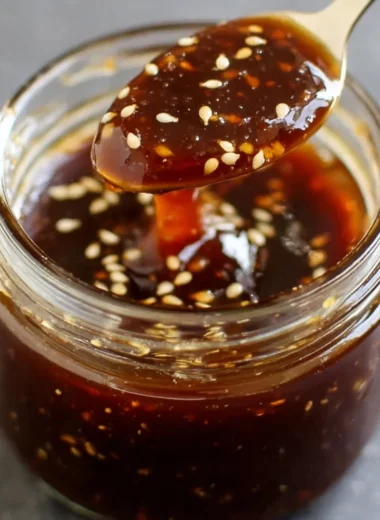 Dish of homemade teriyaki sauce in a bowl with ingredients.