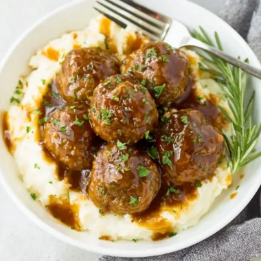 Delicious meatballs served with savory gravy on a plate