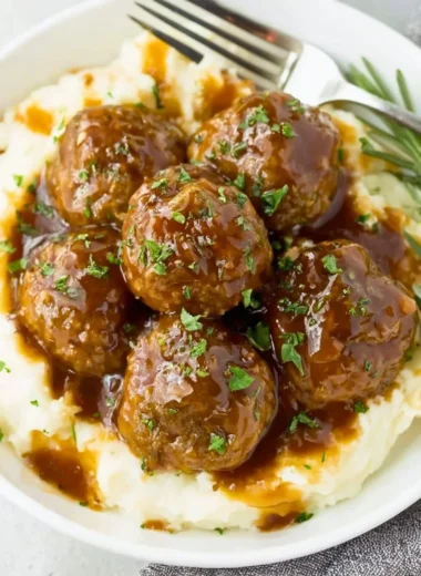 Delicious meatballs served with savory gravy on a plate