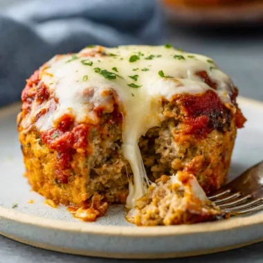 Delicious turkey meatloaf muffins baked to perfection, ready to serve.