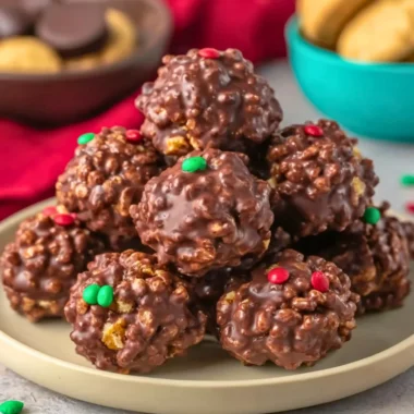 No bake chocolate rice krispie balls on a plate