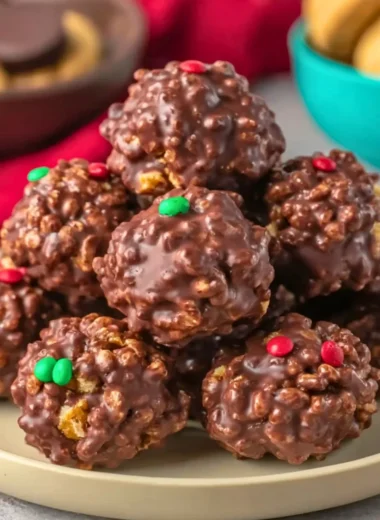 No bake chocolate rice krispie balls on a plate