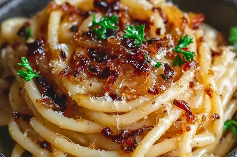 Delicious pasta dish topped with caramelized onions for a savory flavor.