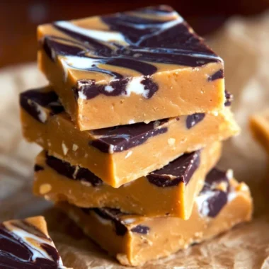 Delicious homemade peanut butter fudge bars with a rich, creamy texture.
