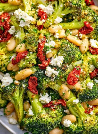 Roasted broccoli salad with butter beans and lemon dressing in a bowl
