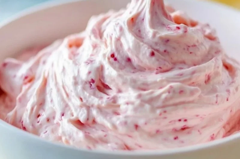 Strawberry marshmallow frosting beautifully decorated on a cupcake