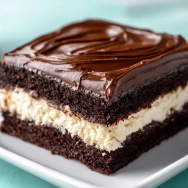 Delicious slice of amazing Ding Dong Cake with chocolate and cream filling