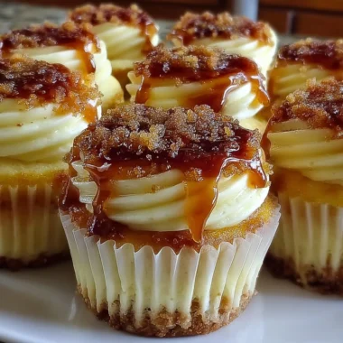 Delicious Vanilla Bean Crème Brûlée Cheesecake Cupcakes topped with caramelized sugar