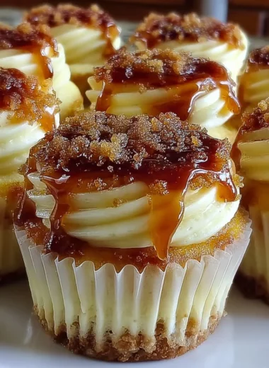 Delicious Vanilla Bean Crème Brûlée Cheesecake Cupcakes topped with caramelized sugar