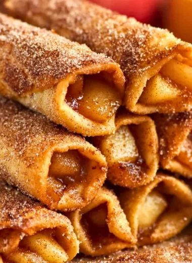 Delicious air fryer apple pie taquitos served with caramel sauce