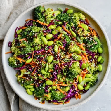 Fresh and colorful broccoli salad with nuts and dressing.