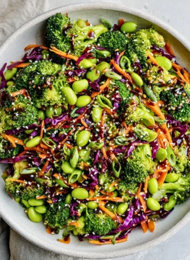 Fresh and colorful broccoli salad with nuts and dressing.