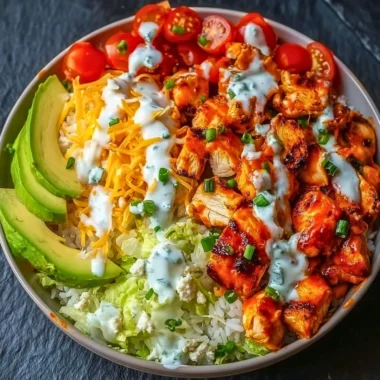 Delicious Buffalo Chicken Bowls with spicy chicken and fresh vegetables