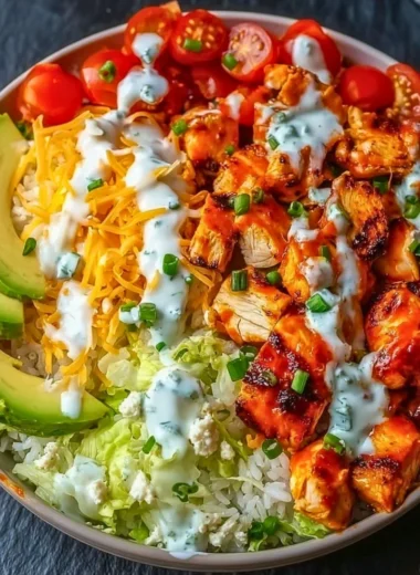 Delicious Buffalo Chicken Bowls with spicy chicken and fresh vegetables