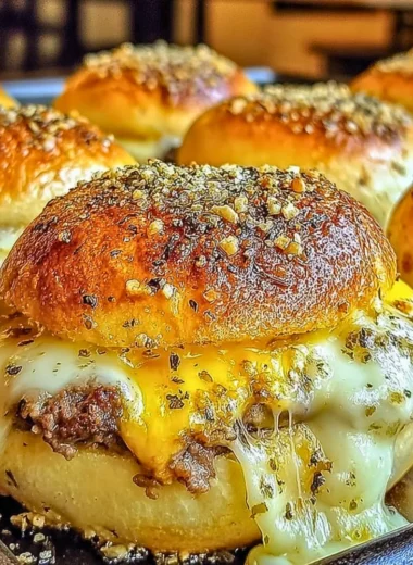 Garlic Parmesan Cheeseburger Bombs baked to golden perfection with melted cheese