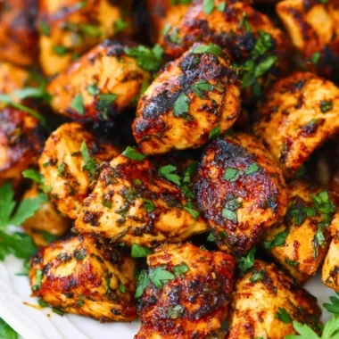 Greek Chicken Bites served with fresh herbs and creamy dip